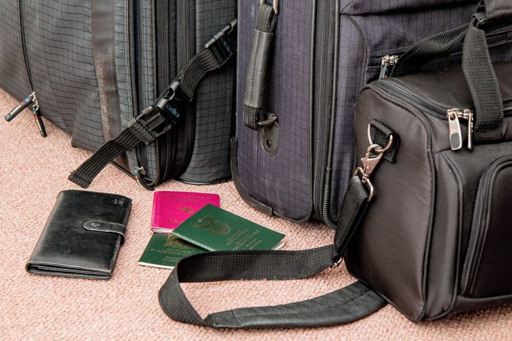 image of suitcases and passports