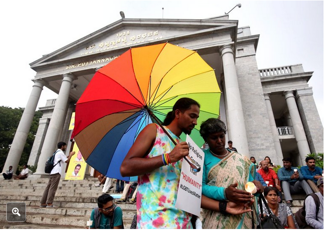 Members of the gay community and other groups in Bangalore, India, held a demonstration Tuesday to condemn the mass shooting at a gay nightclub in Orlando, Fla.